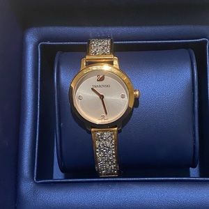 Ladies rose gold  Swarovski watch in box with paperwork